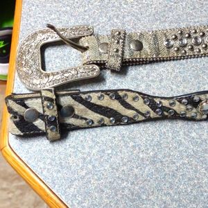 Two girls western belts